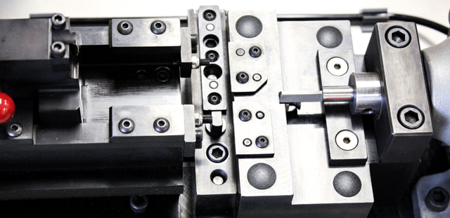 precision machines components assembled to work as an insertion fixture